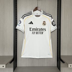 CAMISETA REAL MADRID I 25/26 HOMBRE - CON PARCHES CHAMPIONS LEAGUE - LANZAMIENTO